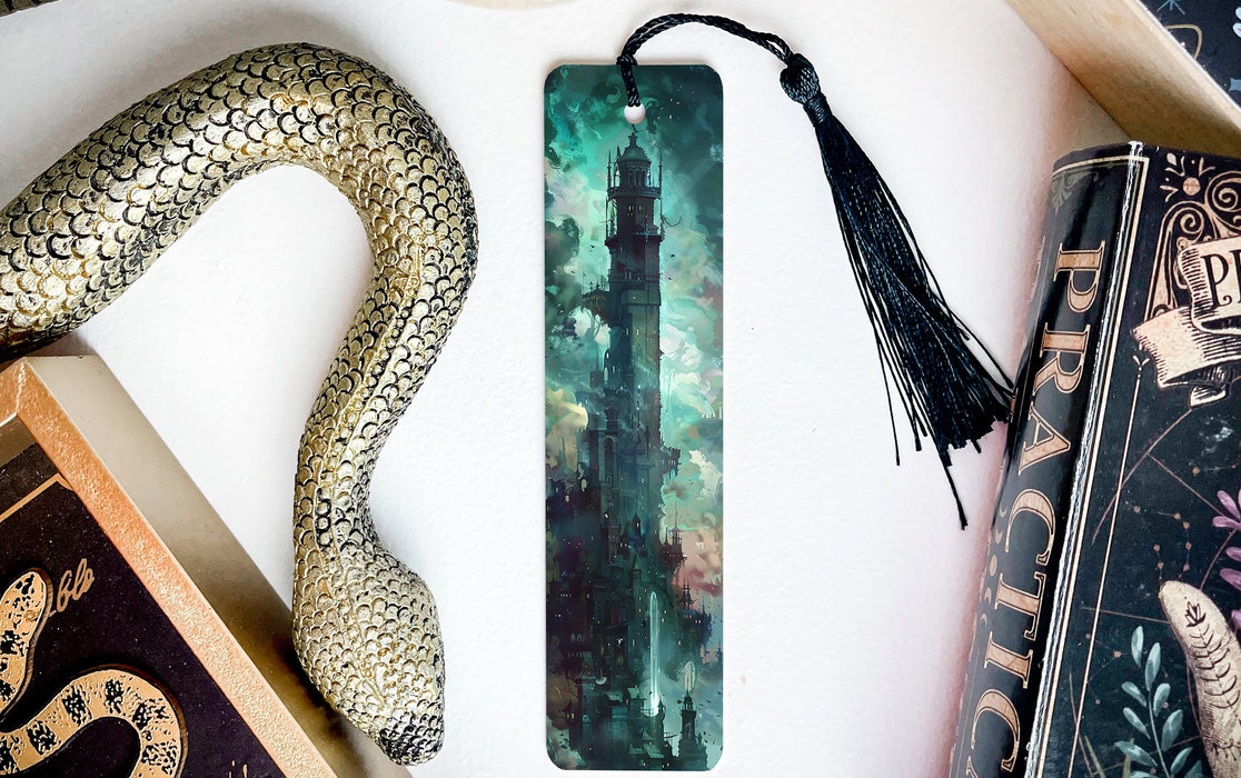 a bookmark, snake, and other books on a table