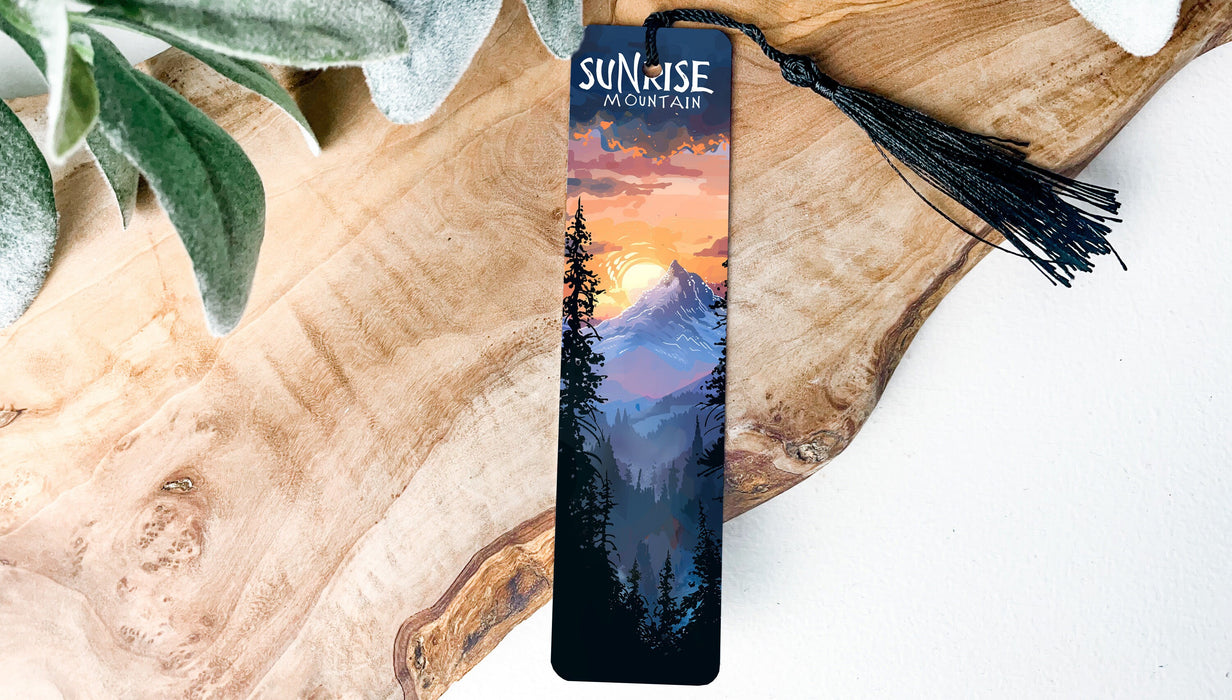 a bookmark with a painting of a mountain scene