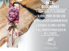 a metal bookmark with a flower on it