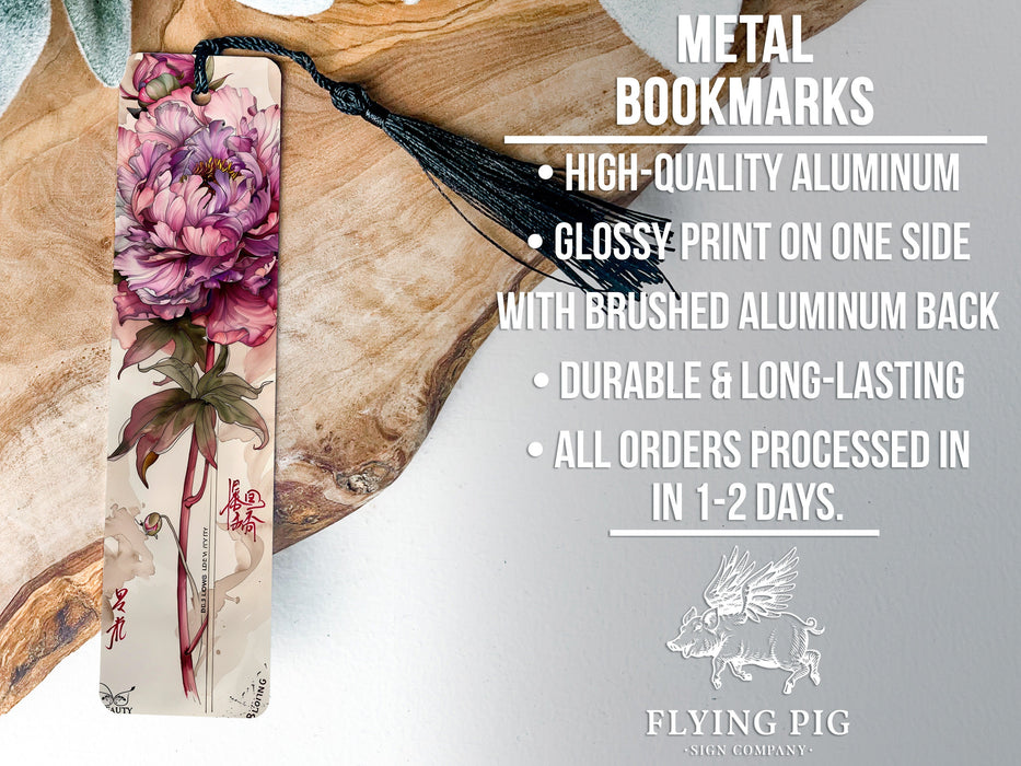 a metal bookmark with a flower on it
