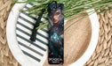 a close up of a bookmark on a plate