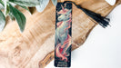 a bookmark with a picture of a unicorn on it