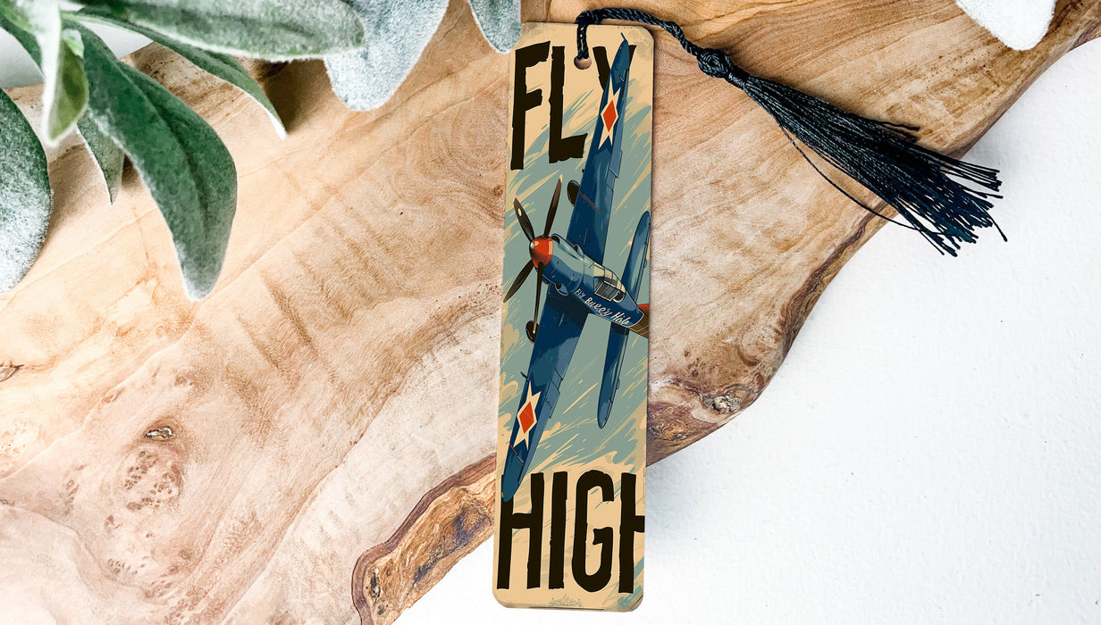 a wooden sign that says fly high on it