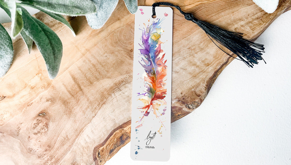 a bookmark with a tassel hanging from it