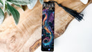 a bookmark with an image of a dragon on it