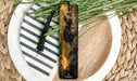 a close up of a plate with a bookmark on it