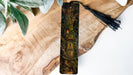 a piece of wood with a painting on it