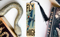 a bookmark with a snake and a snake on it