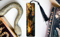 a bookmark with a picture of a woman and a snake on it