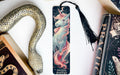 a bookmark with a picture of a unicorn on it