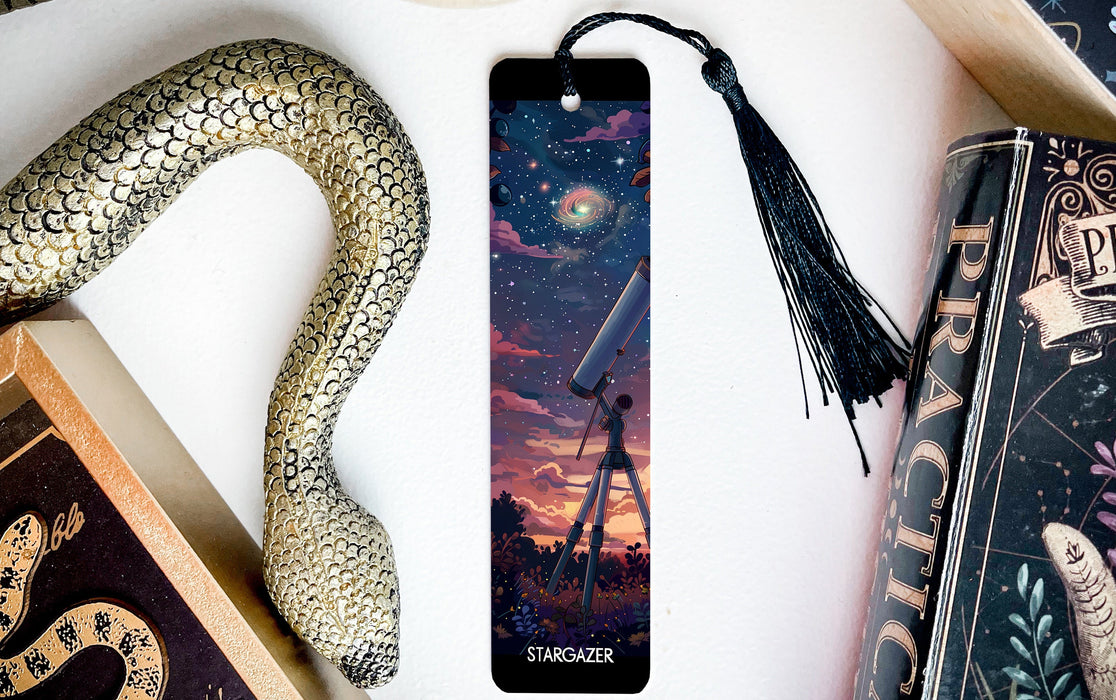 a bookmark with a picture of a telescope on it