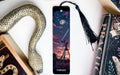 a bookmark with a picture of a telescope on it