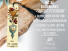 a bookmark with a tassel hanging from it