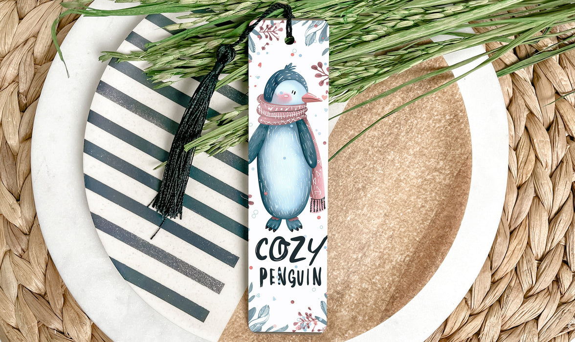 a bookmark with a picture of a penguin on it