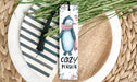 a bookmark with a picture of a penguin on it