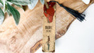 a bookmark with a picture of a bird on it