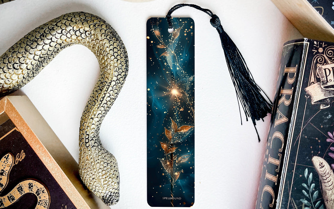 a bookmark, snake, and other items on a table