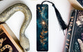 a bookmark, snake, and other items on a table