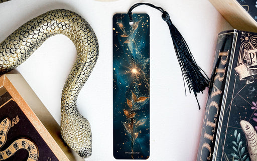 a bookmark, snake, and other items on a table