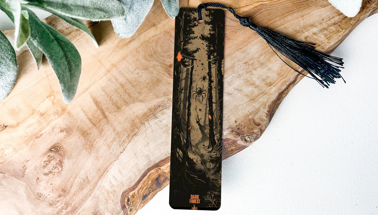 a piece of wood with a tassel on top of it