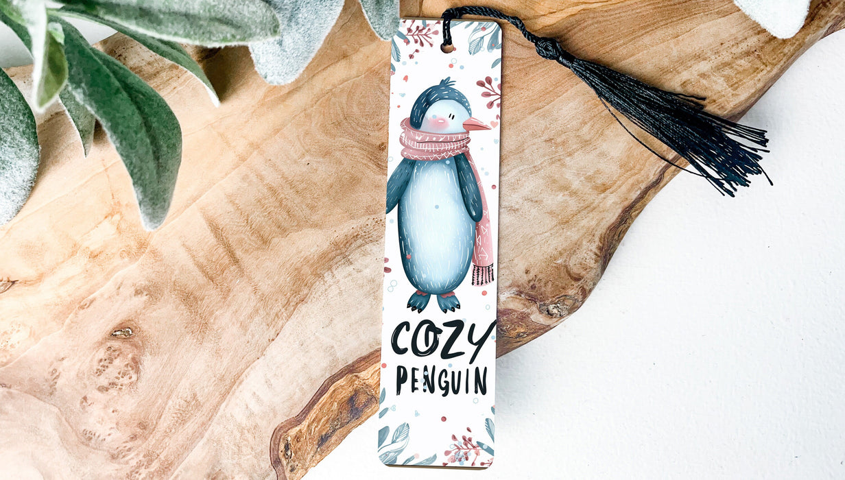 a bookmark with a picture of a penguin on it