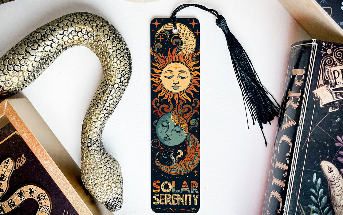 a bookmark with a sun and a moon on it