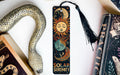 a bookmark with a sun and a moon on it
