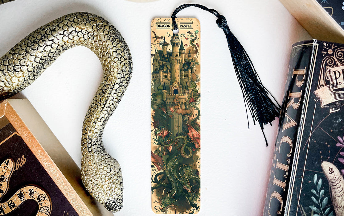 a bookmark with a snake and a book on it