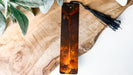 a bookmark with a picture of a man on fire