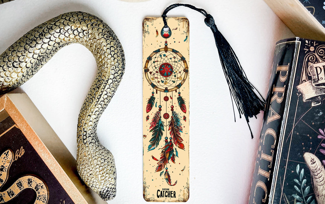 a bookmark, snake, and other items on a table