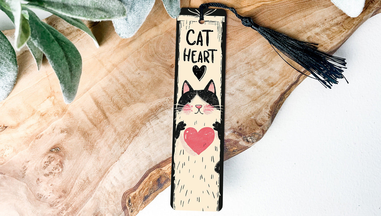 a bookmark with a picture of a cat with a heart on it