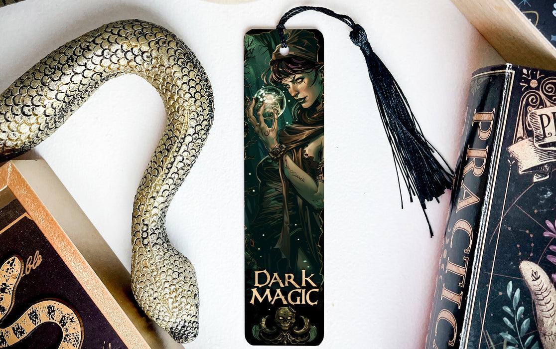 a bookmark with a picture of a woman and a snake on it