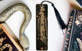 a bookmark, snake, and other items on a table