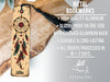 a wooden bookmark with a feather on it