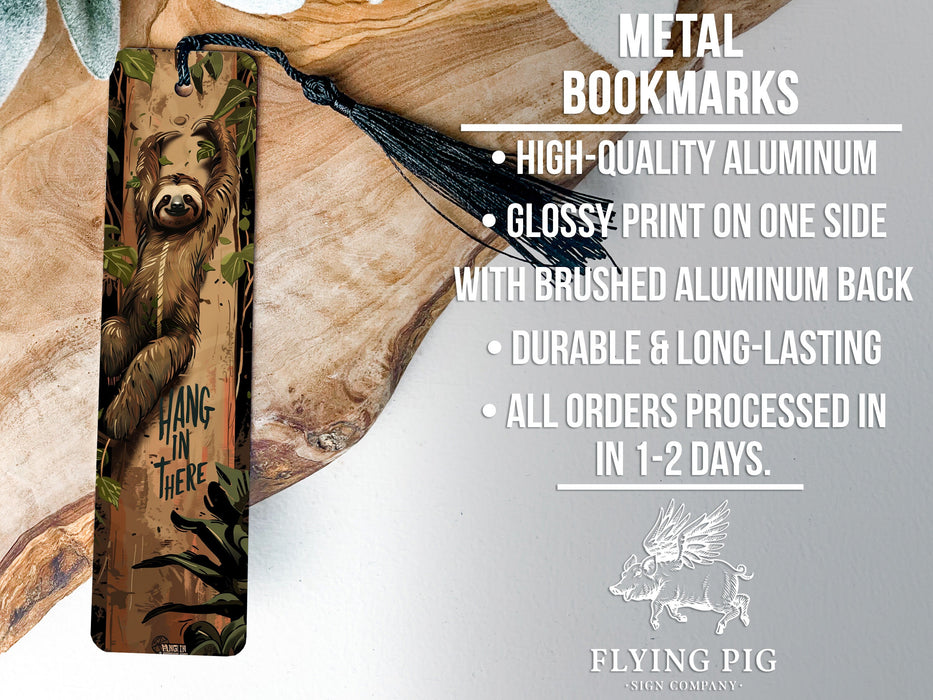 a metal bookmark with a bear on it