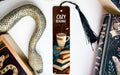 a bookmark with a snake and a cup of coffee