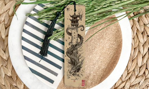a plate with a bookmark and some grass on it