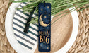 a bookmark with the words dream big on it
