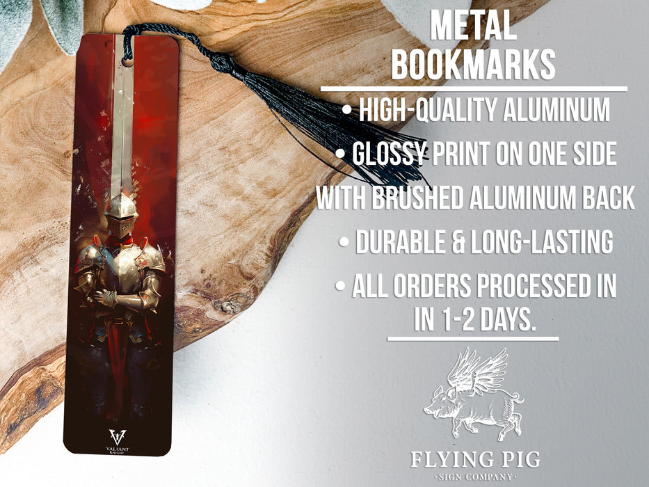 a metal bookmark with a red cover and a black tassel