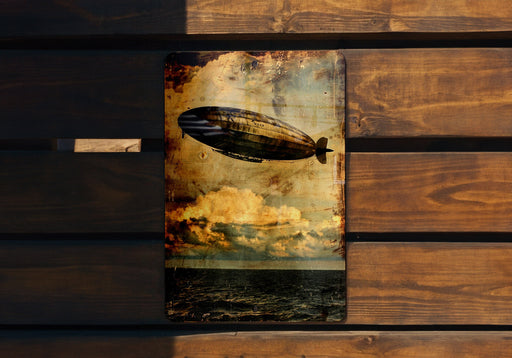 a picture of a hot air balloon flying over the ocean