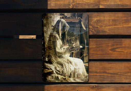 a picture of a statue on a wooden wall