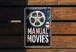 a sign that says manual movies on it