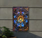 a picture of a flower on a wall