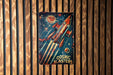 a poster of a space shuttle flying through the sky