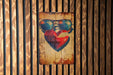a picture of a heart with sunglasses on a wooden wall