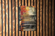 a wooden wall with a painting on it