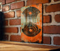 a picture of a painting on a brick wall