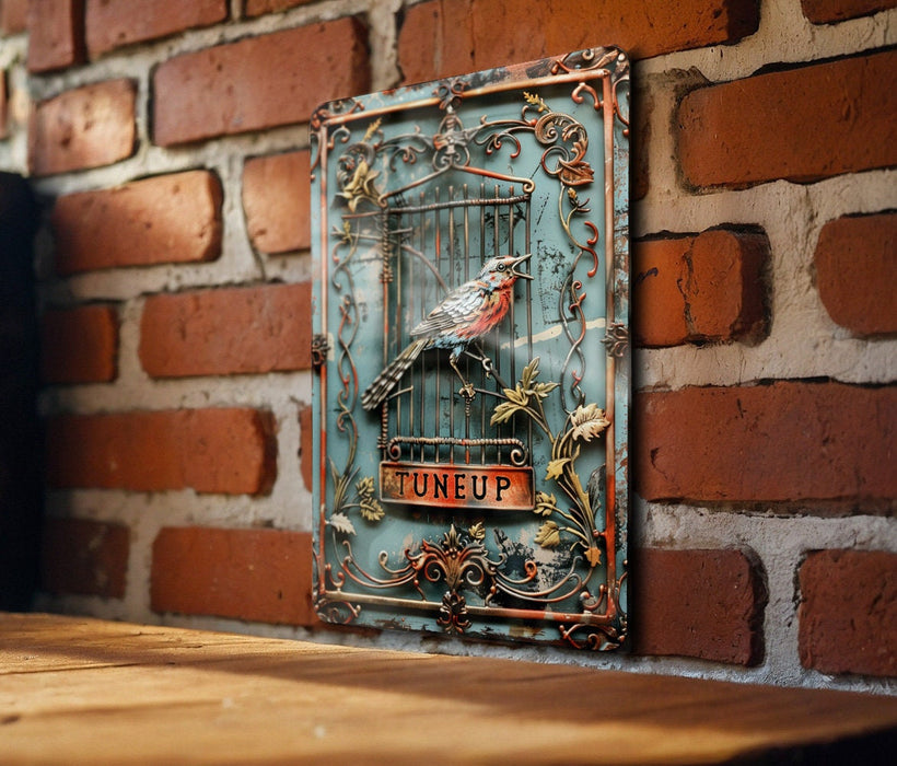 a picture of a bird in a cage on a brick wall