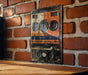 a close up of an old fashioned radio on a brick wall