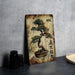 a painting of a bonsai tree on a table